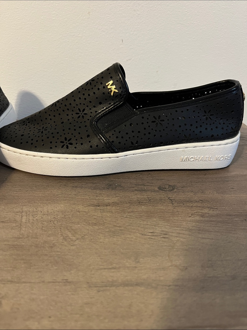 Michael Kors Black Perforated Slip-On Sneakers with White Sole - Picture 2 of 3
